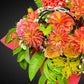 Close-up view of vibrant peach and coral dahlias and roses within the 'Eternal Embrace' Mother's Day bouquet, highlighting fresh petals and textures.