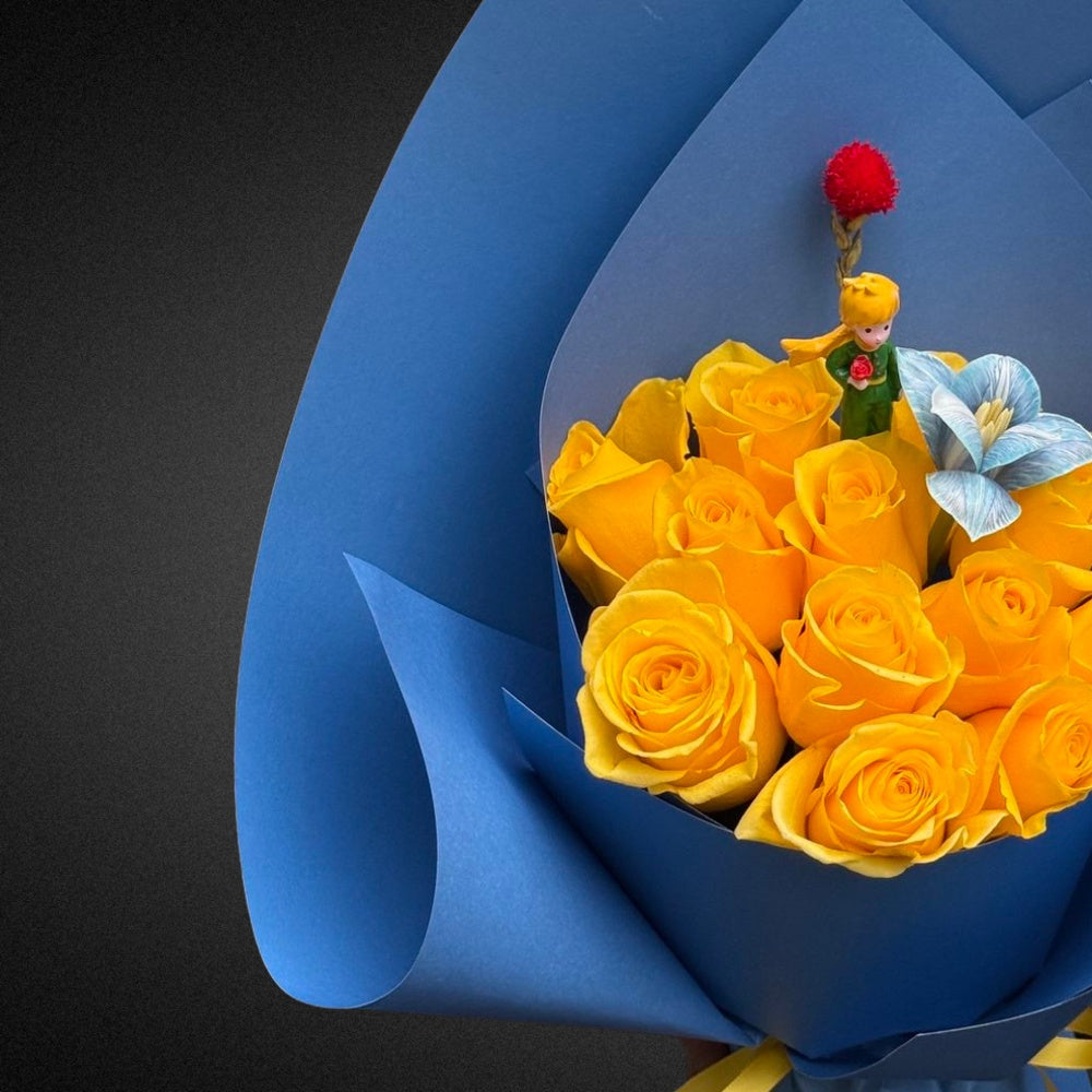 Close-up of the vibrant mixed bright roses and foliage on the artisanal wreath