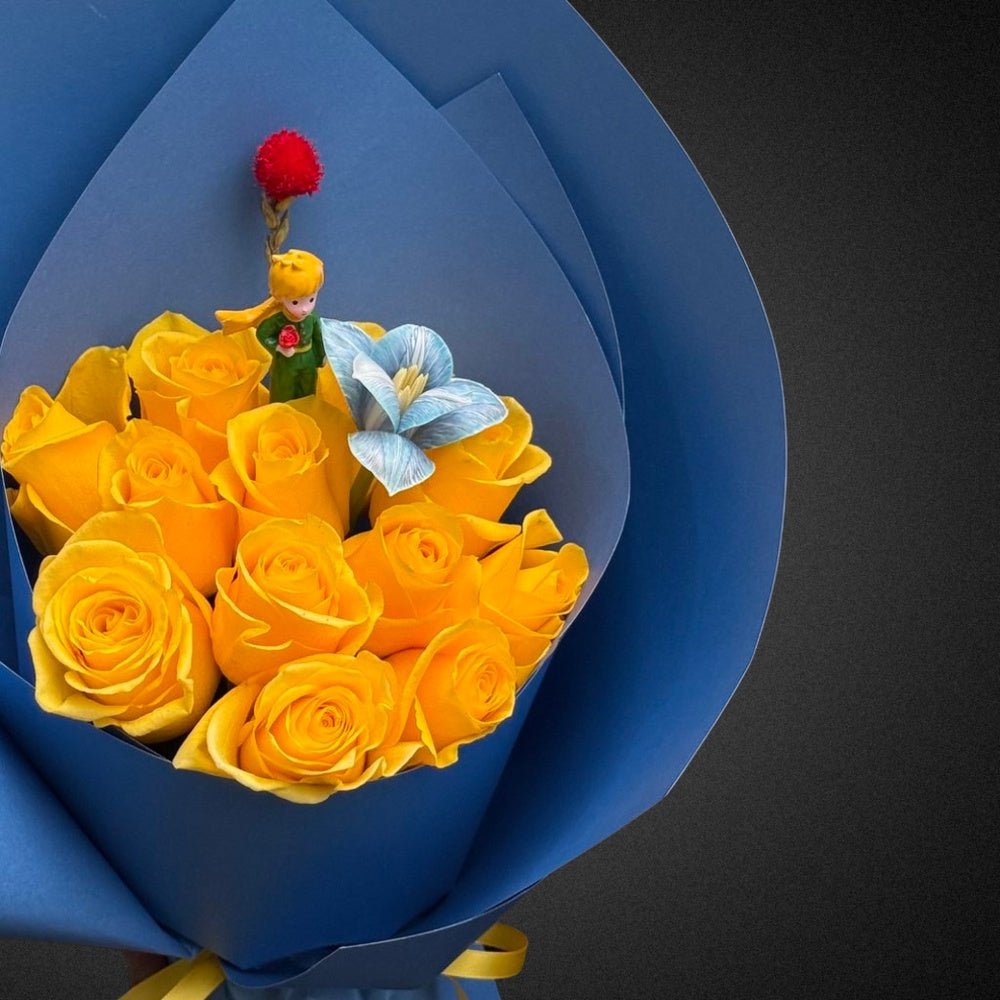 Close-up of the vibrant mixed bright roses and foliage on the artisanal wreath